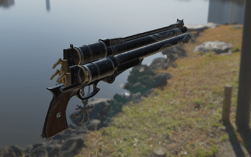 A model of an old-fashioned gun is set against a backdrop of a lake.